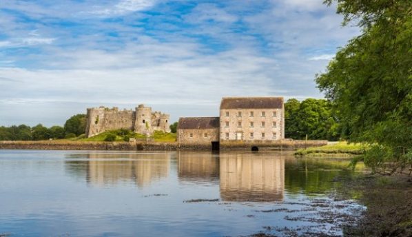 Carew Castle and Tidal Mill, overlooking a Millpond